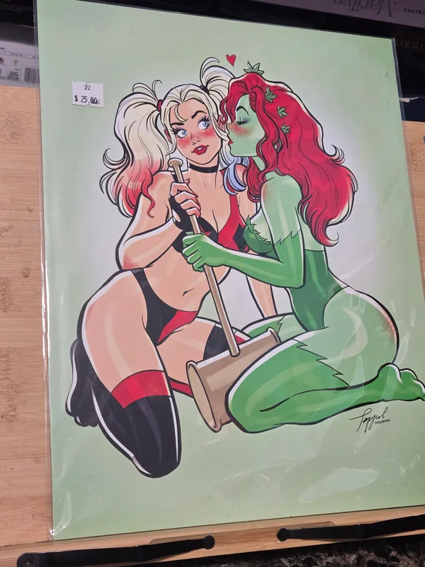 Collectable art print featuring Harley Quinn and Poison Ivy, showcasing a playful and romantic illustration of the DC Comics duo.